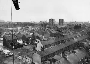 Ancient and Modern - A tall crane vantage point high above the new flats being built Ancient and Modern - A tall crane vantage point high above the new flats being built