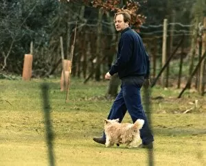 Images Dated 6th November 1995: Andrew Parker Bowles husband of Camilla Parker Bowles is seen out walking their pet dog