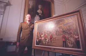 ANDREW PARKER-BOWLES WITH THE PAINTING PRESENTED TO HIM ON HIS ANDREW PARKER-BOWLES WITH THE PAINTING PRESENTED TO HIM ON HIS