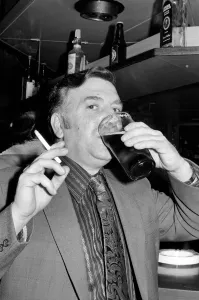 Images Dated 15th April 1975: Andy Bradley enjoying his pint and a fag in the local before the chancellor puts up