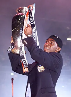 Andy Cole celebrating with the League trophy May 1999 in Manchester Arena as Andy Cole celebrating with the League trophy May 1999 in Manchester Arena as