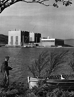 An angler weighs up his prospects in the shadow of Trawsfynydd in Snowdonia An angler weighs up his prospects in the shadow of Trawsfynydd in Snowdonia