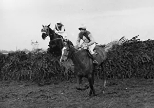 Grand National Gallery: Anglo ridden by Tim Norman clears the last fence in the 1966 Grand National 26th March