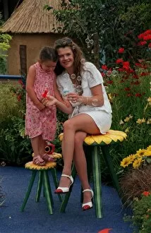 Images Dated 6th July 1998: Annabel Croft TV Presenter July 1998 With her daughter Amber at the Hampton court