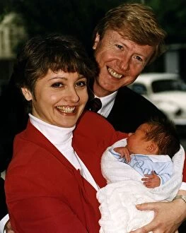 Images Dated 26th May 1993: Anne Diamond TV Presenter with husband Mike Holdsworth and their new baby