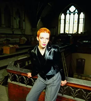 Annie Lennox standing in church 1983
