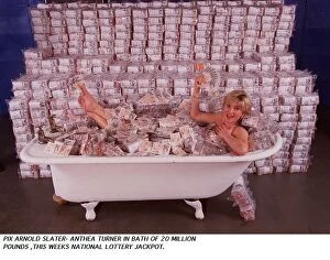 Images Dated 24th May 1995: Anthea Turner in bath of 20 million pounds - prize money for this weeks national lottery