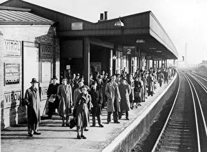 No anticipation of a holiday in the West Country or Filey to cheer these glum-looking No anticipation of a holiday in the West Country or Filey to cheer these glum-looking