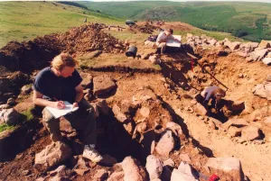 Archaeologists work on a dig in the Breamish Valley, Northumberland Archaeologists work on a dig in the Breamish Valley, Northumberland