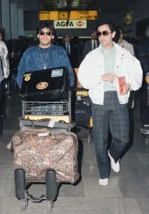 Argentina footballers Diego Maradona is met by his friend Argentina footballers Diego Maradona is met by his friend