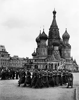 Arms swinging across the body in the characteristic Russian style of marching Arms swinging across the body in the characteristic Russian style of marching