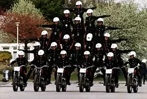 Images Dated 23rd May 1991: Army Regiment Royal Signals White Helmets performing a human pyramid stunt on motorbikes