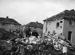 ARP personnel, Air Raid Wardens and Firemen search the devastation of Rowlston ARP personnel, Air Raid Wardens and Firemen search the devastation of Rowlston