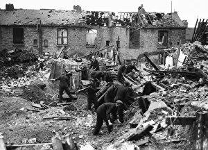 ARP personnel and rescue workers did through the rubble of Sculcoates Lane ARP personnel and rescue workers did through the rubble of Sculcoates Lane