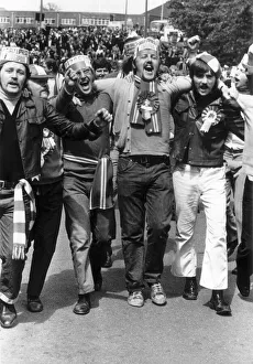 Arsenal football fans celebrate after their team's cup final win against Liverpool at Arsenal football fans celebrate after their team's cup final win against Liverpool at