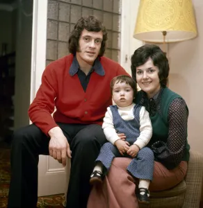 Arsenal footballer John Blockley with wife Jean and son Jamie in their new home Arsenal footballer John Blockley with wife Jean and son Jamie in their new home