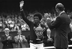Images Dated 5th July 1975: Arthur Ashe waves to fans after winning mens title in 1975 at Wimbledon with Duke of Kent