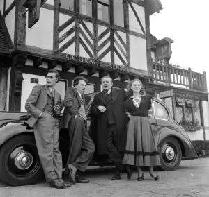 Artist couple Richard and Pat Larter with friends outside their local pub Artist couple Richard and Pat Larter with friends outside their local pub