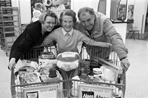 Images Dated 11th December 1991: ASDA trolley dash winner Marjorie Stansfield pictured with Susan Wilkinson of ASDA