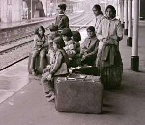 Asian family waiting at Bishops Stortford station, intending to travel to London Asian family waiting at Bishops Stortford station, intending to travel to London