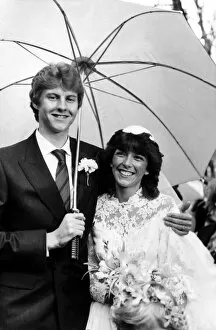 Images Dated 17th December 1983: Athlete Steve Cram Steve Cram and fiancee Karen Waters pictured outside