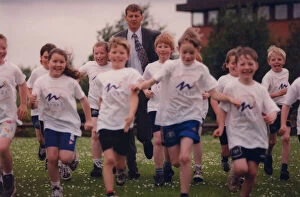 Images Dated 16th June 1998: Athlete Steve Cram Steve Cram trains with pupils from Allendale County