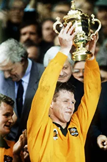 Austalian rugby captain Nick Farr-Jones holding aloft the Rugby Union World Cup Austalian rugby captain Nick Farr-Jones holding aloft the Rugby Union World Cup