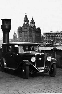 00864 Gallery: An Austin motor car crossing the River Mersey on a luggage boat in Liverpool