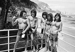 Images Dated 19th January 1985: Australian rock group AC / DC takes time to relax at Ipanema beach in Rio De Janeiro