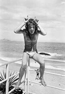 Images Dated 19th January 1985: Australian rock group AC / DC take time to relax at Ipanema beach in Rio De Janeiro