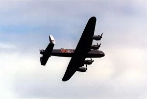 Images Dated 4th August 1996: An Avro Lancaster bomber aircraft of the Battle of Britain Memorial Flight flies past