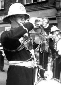 A bandsman playing the bugle and snare drum in July 1977 A bandsman playing the bugle and snare drum in July 1977