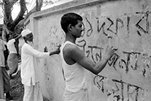 Alegriaproductions260706 Gallery: Bangladesh - signs being chipped off walls, by order of the Military Government