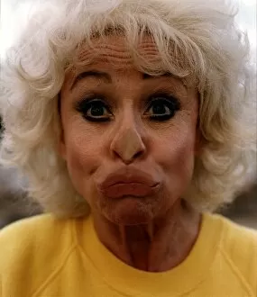 Images Dated 7th January 1994: Barbara Windsor Actress With Her Face Pressed Against A Glass Pane