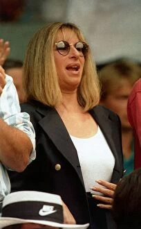 Images Dated 1st July 1993: Barbra Streisand Singer enjoys Agassi playing Tennis