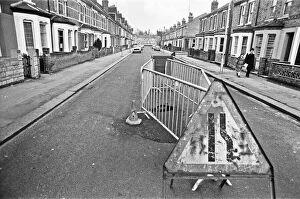 Barriers erected around a large hole in Norfolk Road, Reading, which suddenly appeared