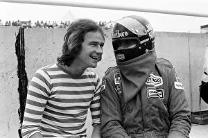 Images Dated 17th July 1976: Barry Sheene and James Hunt at a practice day for the British Grand Prix held at Brands