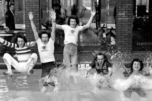 Images Dated 11th March 1975: The Bay City Rollers celebrate their chart success with a quick dip in the pool
