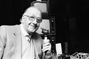 Expressions Gallery: BBC snooker commentator Ted Lowe holding his microphone. 27th January 1986