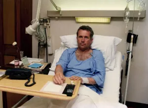 BBC War Correspondent Martin Bell in a London Hospital. Martin Bell a bit shaken sits up BBC War Correspondent Martin Bell in a London Hospital. Martin Bell a bit shaken sits up