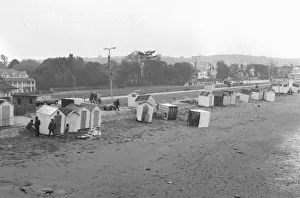 Beach huts strewn around Paignton beach in March 1973 Beach huts strewn around Paignton beach in March 1973