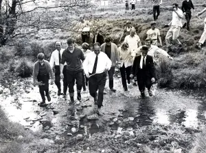 00363 Gallery: Beating the bounds - Llantrisant - Townspeople wade through a small brook led by Eddie