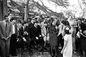 Images Dated 21st February 2013: The Beatles at a Hollywood garden party on their American Tour