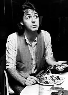 Former Beatles singer Paul McCartney, eating fish and chips. November 1977