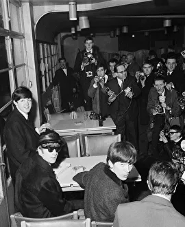 Three of The Beatles surrounded by photographers during a press conference at Le Bourget Three of The Beatles surrounded by photographers during a press conference at Le Bourget