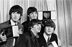 Award Ceremonies Gallery: The Beatles with their Variety Club Awards. L-R: Ringo Starr, John Lennon