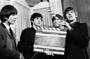 Bands Gallery: The Beatles at the Variety Club Awards, March 1964. George Harrison, Paul McCartney