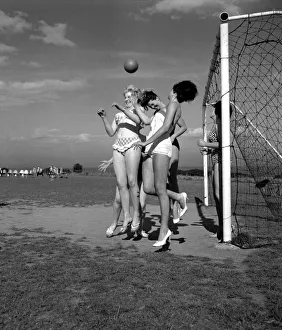 Beauty contest girls playing football at Filey. 30th August 1960 Beauty contest girls playing football at Filey. 30th August 1960