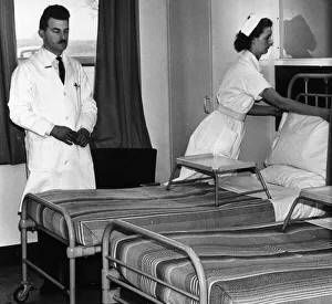 Beds being prepared in bed ward at Geriatrics Unit at Rubery Hill Hospital, Birmingham Beds being prepared in bed ward at Geriatrics Unit at Rubery Hill Hospital, Birmingham