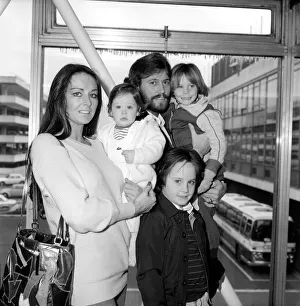 Bee Gees Singer Barry Gibb with his wife Linda and children Travis (12 months) Bee Gees Singer Barry Gibb with his wife Linda and children Travis (12 months)